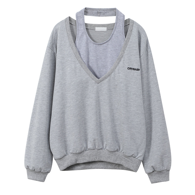 Niche Women's Grey V-neck Sweater with Unique Design