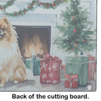 Pomeranian Cozy Christmas Glass Cutting Board