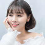 Silver Earrings with Asymmetric Christmas Design