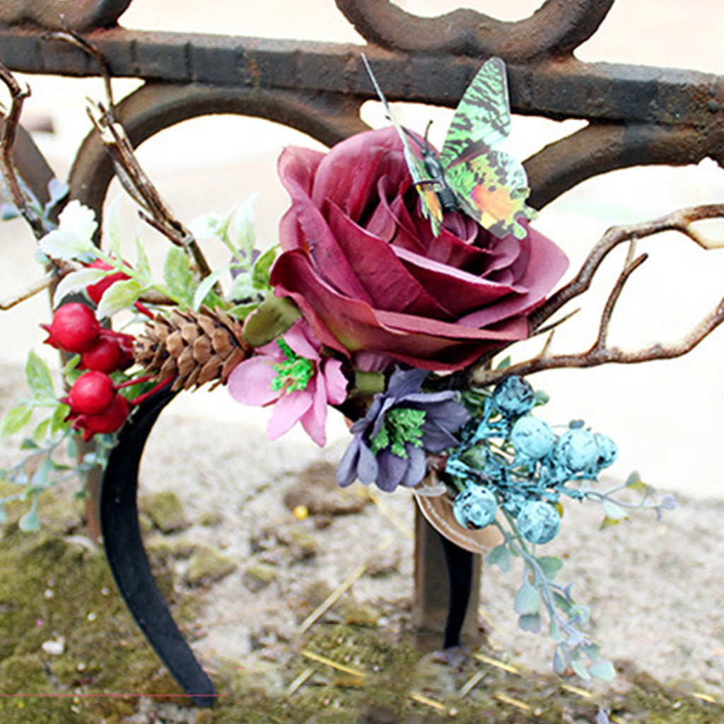 Exaggerated Christmas Antler Headband with Floral Accents