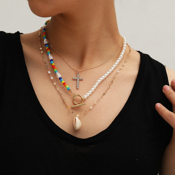 Fashionable Asymmetrical Shell Bead Cross Necklace